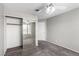 Bedroom featuring mirrored closet doors for ample storage and natural light at 6428 Yarmouth Dr, Las Vegas, NV 89108