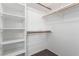 Walk-in closet featuring shelving and hanging rods for optimal storage at 6428 Yarmouth Dr, Las Vegas, NV 89108