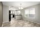 Dining Area featuring Tile floors and plenty of natural light from a large window at 6428 Yarmouth Dr, Las Vegas, NV 89108
