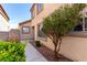 This exterior features a walkway and lush shrubbery at 6428 Yarmouth Dr, Las Vegas, NV 89108