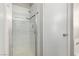 Modern bathroom featuring a sleek glass-enclosed shower with tiled walls at 6428 Yarmouth Dr, Las Vegas, NV 89108