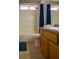 Bathroom with shower, toilet, lighting, and sink at 684 Whispering Palms Dr, Las Vegas, NV 89123