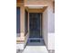Close-up of the front door, showcasing a secure metal screen door at 684 Whispering Palms Dr, Las Vegas, NV 89123