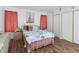 Comfortable bedroom with Paris-themed decor and ample closet space at 7268 Wichita Ct, Las Vegas, NV 89119