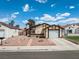 Charming single-story home featuring a two-car garage and low-maintenance rock landscaping at 7268 Wichita Ct, Las Vegas, NV 89119