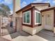 Close up of the entrance of the house with security gate and privacy window at 7268 Wichita Ct, Las Vegas, NV 89119