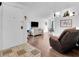 Inviting living room with hardwood floors and ample natural light, creating a warm and welcoming atmosphere at 7268 Wichita Ct, Las Vegas, NV 89119