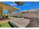 An outdoor patio offers room for entertaining and a low maintenance backyard at 7817 Safari Ln, Las Vegas, NV 89129