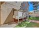 The backyard features a chicken coop and low-maintenance artificial turf at 7817 Safari Ln, Las Vegas, NV 89129