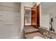 Bathroom has a cabinet above the counter and a shower-tub combination at 7817 Safari Ln, Las Vegas, NV 89129