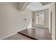 Dining room with high ceilings, large window, and elegant chandelier at 7817 Safari Ln, Las Vegas, NV 89129