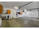 Spacious three-car garage with plenty of room for storage and a wash sink at 7817 Safari Ln, Las Vegas, NV 89129