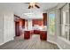 Beautiful kitchen features an island, stainless appliances, and wood floors at 7817 Safari Ln, Las Vegas, NV 89129