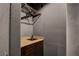 Compact sink and vanity area, featuring dark wood cabinetry and a neutral-toned countertop at 7817 Safari Ln, Las Vegas, NV 89129
