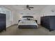 Comfortable bedroom suite showcasing neutral tones, generous space, and ample natural light at 7872 Regency Park St, Las Vegas, NV 89149