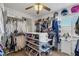 Walk-in closet with custom shelving and ample storage space for clothes and shoes at 7872 Regency Park St, Las Vegas, NV 89149