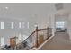 Upper hallway with views of the main living area and the primary bedroom at 7872 Regency Park St, Las Vegas, NV 89149