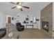 Spacious living room showcases a fireplace, comfortable seating, and seamless flow for entertaining at 7872 Regency Park St, Las Vegas, NV 89149