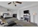 Inviting main bedroom retreat with a fireplace and comfortable seating area at 7872 Regency Park St, Las Vegas, NV 89149