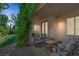 Comfortable covered patio with seating area, perfect for outdoor entertaining at 7872 Regency Park St, Las Vegas, NV 89149