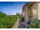Relaxing outdoor patio area with comfortable seating and lush landscaping at 7872 Regency Park St, Las Vegas, NV 89149