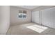 Bright bedroom with carpet, window and double closets for storage at 805 Dana Hills Ct # 104, Las Vegas, NV 89134