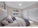 Cozy bedroom with neutral tones, closet space, and carpet flooring offers a comfortable and private retreat at 805 Dana Hills Ct # 104, Las Vegas, NV 89134