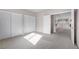 Bedroom with closet doors and an open doorway, creating flow to the living area at 805 Dana Hills Ct # 104, Las Vegas, NV 89134