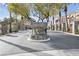 The Terraces on the Green entrance shows beautiful landscaping and well maintained grounds at 805 Dana Hills Ct # 104, Las Vegas, NV 89134