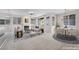 Bright living room featuring a fireplace, balcony access, and an adjacent dining area for comfortable living at 805 Dana Hills Ct # 104, Las Vegas, NV 89134