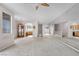 Spacious living room with carpet, natural light and an adjacent kitchen at 805 Dana Hills Ct # 104, Las Vegas, NV 89134