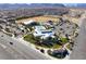 Aerial view of the community center, showcasing the pool, clubhouse, and surrounding neighborhood at 8058 Big Skye Ranch St, Las Vegas, NV 89166