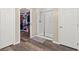 Bathroom area featuring a shower, walk-in closet, and tile floors at 8058 Big Skye Ranch St, Las Vegas, NV 89166