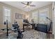 Functional office space features natural light, desk, and workout area, blending work and wellness at 8058 Big Skye Ranch St, Las Vegas, NV 89166