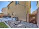 Backyard featuring a grill and gated entrance, providing an outdoor living space at 8091 Mosaic Sunrise Ln, Las Vegas, NV 89166