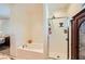 Bright bathroom view with shower and bathtub at 8091 Mosaic Sunrise Ln, Las Vegas, NV 89166