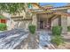 Inviting front porch with gated entrance and covered seating area leading to the front door at 8091 Mosaic Sunrise Ln, Las Vegas, NV 89166