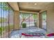 Covered front porch with secure gated entrance offering a private outdoor living space at 8091 Mosaic Sunrise Ln, Las Vegas, NV 89166