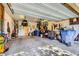 Spacious garage featuring equipment, tools and ample storage solutions, catering to various needs at 8091 Mosaic Sunrise Ln, Las Vegas, NV 89166