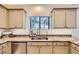 Stylish kitchen featuring granite countertops, stainless steel appliances, and well-lit workspace at 8091 Mosaic Sunrise Ln, Las Vegas, NV 89166