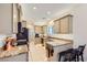 Well-equipped kitchen featuring granite countertops, stainless steel appliances, and ample cabinet space at 8091 Mosaic Sunrise Ln, Las Vegas, NV 89166