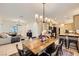 Open-concept living area with dining space, and modern decor, creating a welcoming and connected atmosphere at 8091 Mosaic Sunrise Ln, Las Vegas, NV 89166