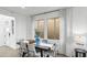 Bright dining area featuring modern decor, stylish curtains, and ample natural light at 84 Via Franello, Henderson, NV 89011