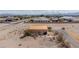 Captivating aerial view showcasing a quaint desert home with metal roof at 8430 Gagnier Blvd, Las Vegas, NV 89113