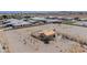 Aerial view displaying a residence on a large lot, framed by community at 8430 Gagnier Blvd, Las Vegas, NV 89113