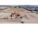 An aerial capture showcases a property with a well-kept driveway and cozy dwelling at 8430 Gagnier Blvd, Las Vegas, NV 89113