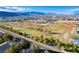 A great view of the community, with schools and park, with mountains in the distance at 9050 W Warm Springs Rd # 1074, Las Vegas, NV 89148