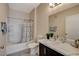 Bathroom featuring marble countertop vanity and shower-tub combo at 9050 W Warm Springs Rd # 1074, Las Vegas, NV 89148