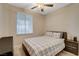 Bright bedroom with a comfortable queen bed and neutral decor at 9050 W Warm Springs Rd # 1074, Las Vegas, NV 89148