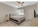 Bedroom featuring neutral palette, ceiling fan and window for ample natural light at 9050 W Warm Springs Rd # 1074, Las Vegas, NV 89148
